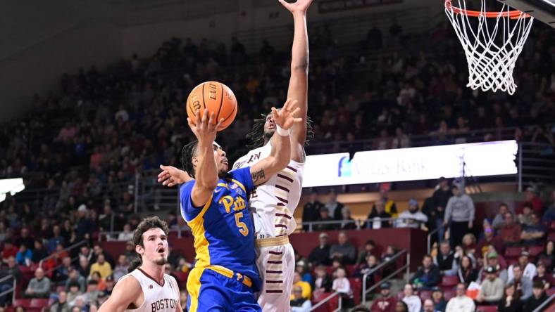 Mar 2, 2024; Chestnut Hill, Massachusetts, USA; Pittsburgh Panthers guard Ishmael Leggett (5) shoots a lay up against the Boston College Eagles during the first half at Conte Forum. Mandatory Credit: Eric Canha-USA TODAY Sports