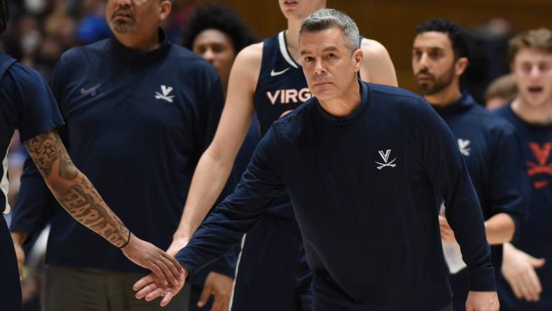 Mar 2, 2024; Durham, North Carolina, USA; Virginia Cavaliers head coach Tony Bennett greets players during a timeout in  the first half  against the Duke Blue Devils at Cameron Indoor Stadium. Mandatory Credit: Rob Kinnan-USA TODAY Sports