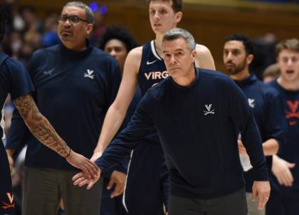 Mar 2, 2024; Durham, North Carolina, USA; Virginia Cavaliers head coach Tony Bennett greets players during a timeout in  the first half  against the Duke Blue Devils at Cameron Indoor Stadium. Mandatory Credit: Rob Kinnan-USA TODAY Sports
