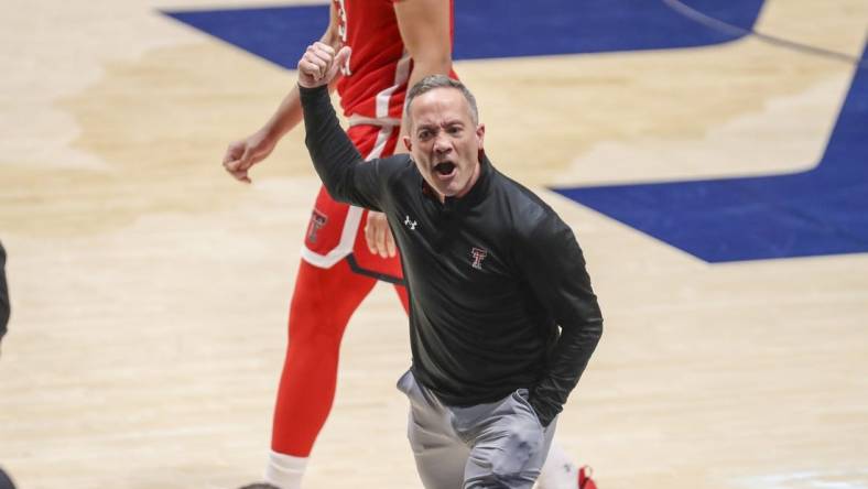 Mar 2, 2024; Morgantown, West Virginia, USA; Texas Tech Red Raiders head coach Grant McCasland argues a call during the first half against the West Virginia Mountaineers at WVU Coliseum. Mandatory Credit: Ben Queen-USA TODAY Sports