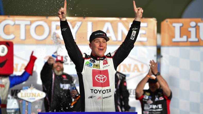 Mar 2, 2024; Las Vegas, Nevada, USA; NASCAR Xfinity Series driver John Hunter Nemechek (20) celebrates his victory of the Liuna 300 at Las Vegas Motor Speedway. Mandatory Credit: Gary A. Vasquez-USA TODAY Sports