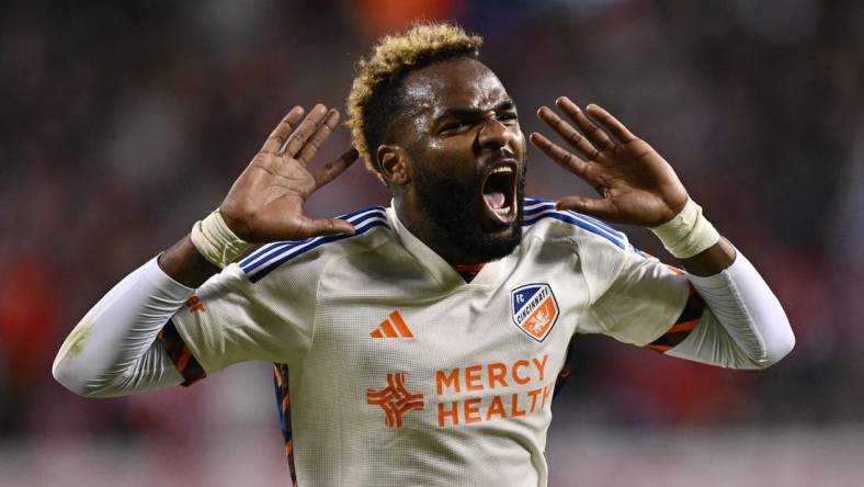 Mar 2, 2024; Chicago, Illinois, USA; FC Cincinnati forward Aaron Boupendza (9) celebrates after scoring against the Chicago Fire FC in the first half at Soldier Field. Mandatory Credit: Jamie Sabau-USA TODAY Sports