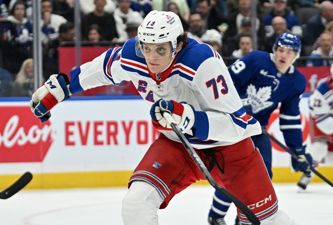 Mar 2, 2024; Toronto, Ontario, CAN;  New York Rangers forward Matt Rempe (73) pursues the play against the Toronto Maple Leafs in the third period at Scotiabank Arena. Mandatory Credit: Dan Hamilton-USA TODAY Sports