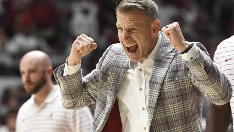 Mar 2, 2024; Tuscaloosa, Alabama, USA;  Alabama head coach Nate Oats cheers on his team as they play Tennessee at Coleman Coliseum. Mandatory Credit: Gary Cosby Jr.-USA TODAY Sports