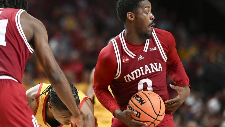 Mar 3, 2024; College Park, Maryland, USA;  Indiana Hoosiers guard Xavier Johnson (0) steals the ball from from Maryland Terrapins forward Julian Reese (10) during the second half at Xfinity Center. Mandatory Credit: Tommy Gilligan-USA TODAY Sports