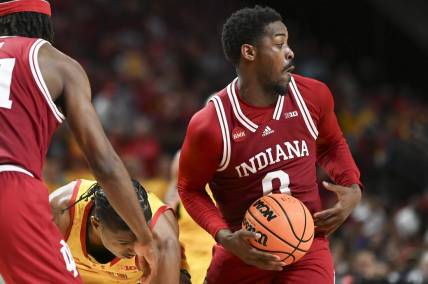 Mar 3, 2024; College Park, Maryland, USA;  Indiana Hoosiers guard Xavier Johnson (0) steals the ball from from Maryland Terrapins forward Julian Reese (10) during the second half at Xfinity Center. Mandatory Credit: Tommy Gilligan-USA TODAY Sports