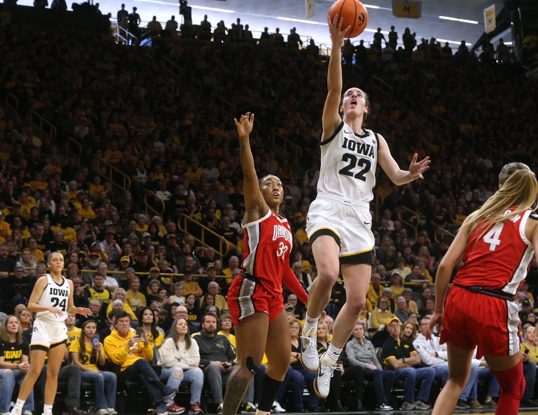 Iowa   s Caitlin Clark (22) shoots against Ohio State Sunday, March 3, 2024 at Carver-Hawkeye Arena in Iowa City, Iowa.
