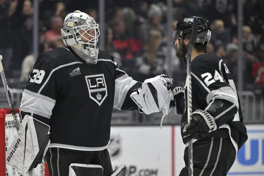 Mar 3, 2024; Los Angeles, California, USA; Los Angeles Kings center Phillip Danault (24) is congratulated by goaltender Cam Talbot (39) after scoring a hat trick in the third period against the New Jersey Devils at Crypto.com Arena. Mandatory Credit: Jayne Kamin-Oncea-USA TODAY Sports