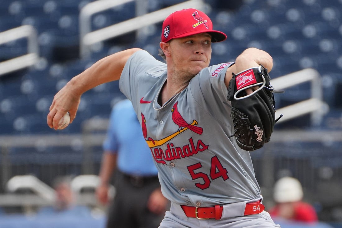 Mar 4, 2024; West Palm Beach, Florida, USA;  St. Louis Cardinals starting pitcher Sonny Gray (54) pitches against the Washington Nationals in the first inning at CACTI Ballpark of the Palm Beaches. Mandatory Credit: Jim Rassol-USA TODAY Sports
