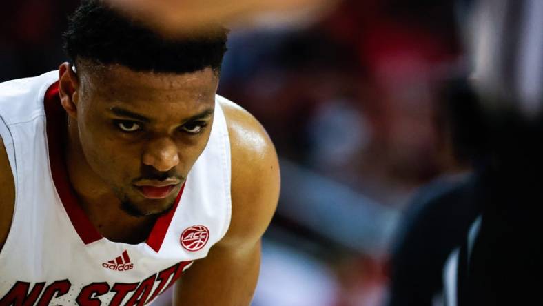 Mar 4, 2024; Raleigh, North Carolina, USA; North Carolina State Wolfpack guard Casey Morsell (14) eyes the ball during the first half against Duke Blue Devils at PNC Arena. Mandatory Credit: Jaylynn Nash-USA TODAY Sports