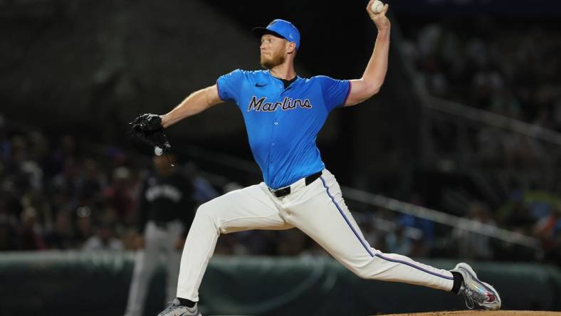 Mar 4, 2024; Jupiter, Florida, USA; Miami Marlins starting pitcher A.J. Puk (35) delivers a pitch against the New York Yankees during the first inning at Roger Dean Chevrolet Stadium. Mandatory Credit: Sam Navarro-USA TODAY Sports