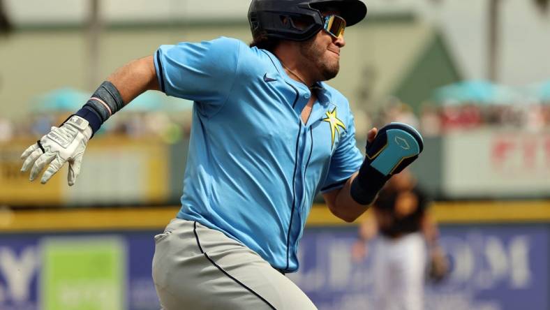 Mar 1, 2024; Bradenton, Florida, USA; Tampa Bay Rays first baseman Jonathan Aranda (62) runs home to score a run during the first inning against the Pittsburgh Pirates at LECOM Park. Mandatory Credit: Kim Klement Neitzel-USA TODAY Sports