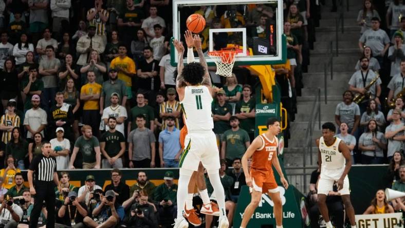 Mar 4, 2024; Waco, Texas, USA;  Baylor Bears forward Jalen Bridges (11) scores a three point basket against the Texas Longhorns during the first half at Paul and Alejandra Foster Pavilion. Mandatory Credit: Chris Jones-USA TODAY Sports