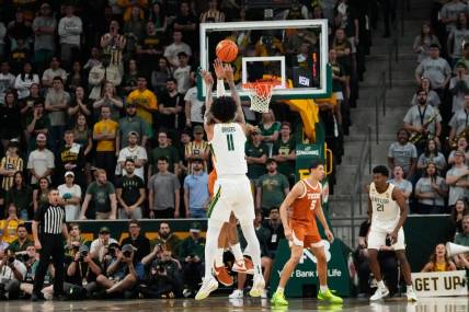 Mar 4, 2024; Waco, Texas, USA;  Baylor Bears forward Jalen Bridges (11) scores a three point basket against the Texas Longhorns during the first half at Paul and Alejandra Foster Pavilion. Mandatory Credit: Chris Jones-USA TODAY Sports