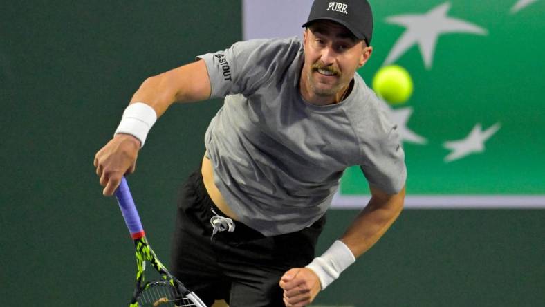 Mar 4, 2024; Indian Wells, CA, USA;  Steve Johnson (USA) hits a shot during his qualifying match against Emilio Nava (USA) in the BNP Paribas Open at the Indian Wells Tennis Garden. Mandatory Credit: Jayne Kamin-Oncea-USA TODAY Sports