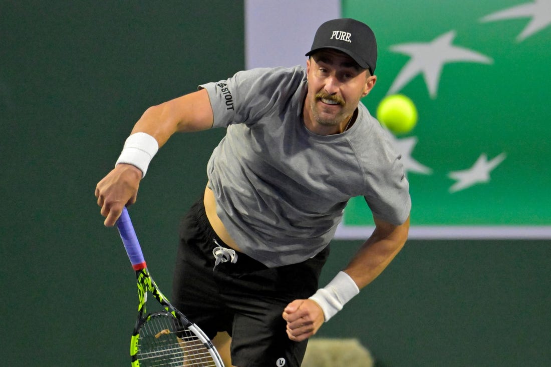 Mar 4, 2024; Indian Wells, CA, USA;  Steve Johnson (USA) hits a shot during his qualifying match against Emilio Nava (USA) in the BNP Paribas Open at the Indian Wells Tennis Garden. Mandatory Credit: Jayne Kamin-Oncea-USA TODAY Sports