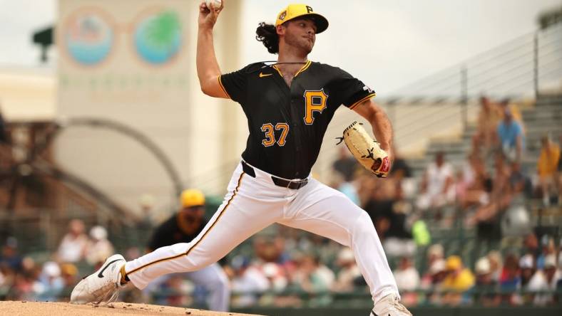 Mar 5, 2024; Bradenton, Florida, USA;  Pittsburgh Pirates starting pitcher Jared Jones (37) throws a pitch during the first inning against the Toronto Blue Jays at LECOM Park. Mandatory Credit: Kim Klement Neitzel-USA TODAY Sports