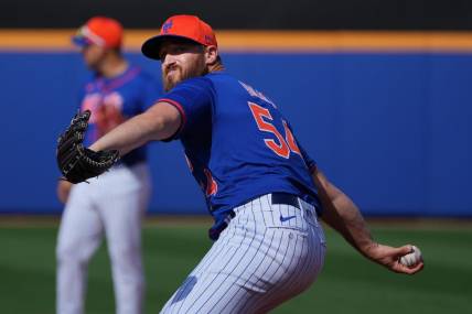 Mar 5, 2024; Port St. Lucie, Florida, USA;  New York Mets pitcher Austin Adams (54) warms-up in the seventh inning against the New York Yankees at Clover Park. Mandatory Credit: Jim Rassol-USA TODAY Sports