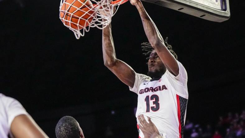 Mar 5, 2024; Athens, Georgia, USA; Georgia Bulldogs forward Dylan James (13) dunks against the Mississippi Rebels during the first half at Stegeman Coliseum. Mandatory Credit: Dale Zanine-USA TODAY Sports