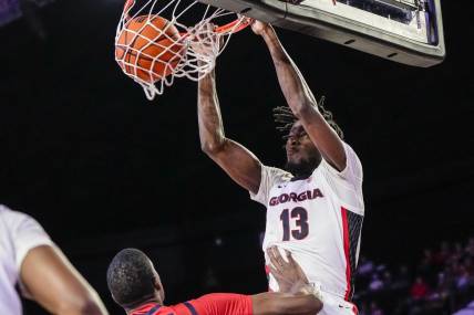 Mar 5, 2024; Athens, Georgia, USA; Georgia Bulldogs forward Dylan James (13) dunks against the Mississippi Rebels during the first half at Stegeman Coliseum. Mandatory Credit: Dale Zanine-USA TODAY Sports