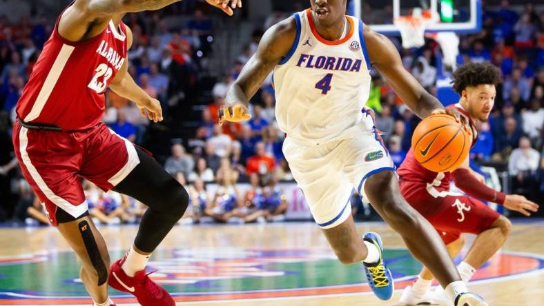 Florida Gators forward Tyrese Samuel (4) drives to the basket during the first half. The Florida men's basketball team hosted the Alabama Crimson Tied at Exactech Arena at the Stephen C. O   Connell Center in Gainesville, FL on Tuesday, March 5, 2024. [Doug Engle/Ocala Star Banner]