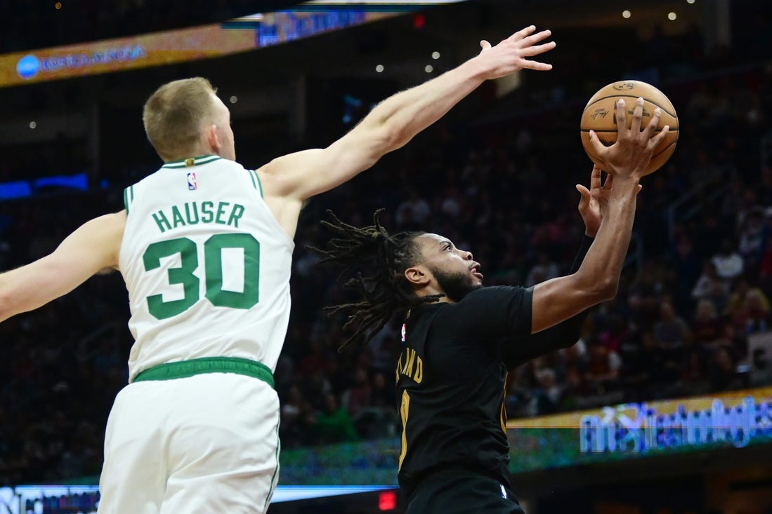 Mar 5, 2024; Cleveland, Ohio, USA; Cleveland Cavaliers guard Darius Garland (10) drives to the basket against Boston Celtics forward Sam Hauser (30) during the second half at Rocket Mortgage FieldHouse. Mandatory Credit: Ken Blaze-USA TODAY Sports