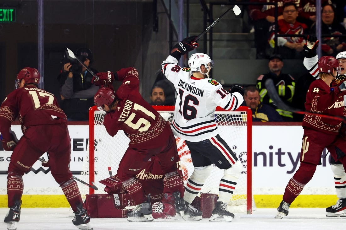 Mar 5, 2024; Tempe, Arizona, USA;  Chicago Blackhawks center Jason Dickinson (16) celebrates after scoring a goal during the second period of the game against the Arizona Coyotes at Mullett Arena. Mandatory Credit: Mark J. Rebilas-USA TODAY Sports