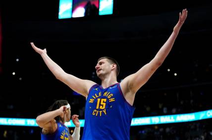 Mar 5, 2024; Denver, Colorado, USA; Denver Nuggets center Nikola Jokic (15) reacts to a foul in the second half against the Phoenix Suns at Ball Arena. Mandatory Credit: Ron Chenoy-USA TODAY Sports