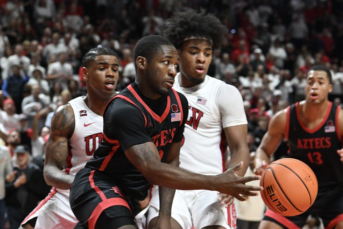 Mar 5, 2024; Las Vegas, Nevada, USA; San Diego State Aztecs guard Darrion Trammell (12) passes the ball against the UNLV Rebels in the second half at Thomas & Mack Center. Mandatory Credit: Candice Ward-USA TODAY Sports