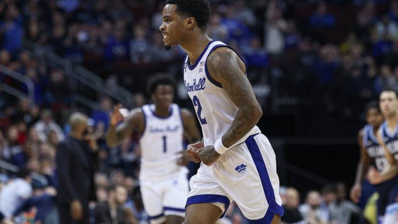 Mar 6, 2024; Newark, New Jersey, USA; Seton Hall Pirates guard Al-Amir Dawes (2) reacts after a three point basket during the first half against the Villanova Wildcats at Prudential Center. Mandatory Credit: Vincent Carchietta-USA TODAY Sports