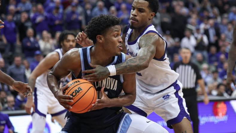 Mar 6, 2024; Newark, New Jersey, USA; Villanova Wildcats guard Jordan Longino (15) is guarded by Seton Hall Pirates guard Al-Amir Dawes (2) during the first half at Prudential Center. Mandatory Credit: Vincent Carchietta-USA TODAY Sports