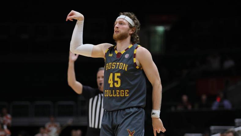 Mar 6, 2024; Coral Gables, Florida, USA; Boston College Eagles guard Mason Madsen (45) watches his shot against the Miami Hurricanes during the first half at Watsco Center. Mandatory Credit: Sam Navarro-USA TODAY Sports