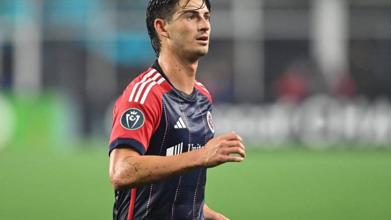 Mar 6, 2024; Foxborough, MA, USA; New England Revolution midfielder Ian Harkes (14) runs off of the field after a game against Liga Deportiva Alajuelense at Gillette Stadium. Mandatory Credit: Brian Fluharty-USA TODAY Sports