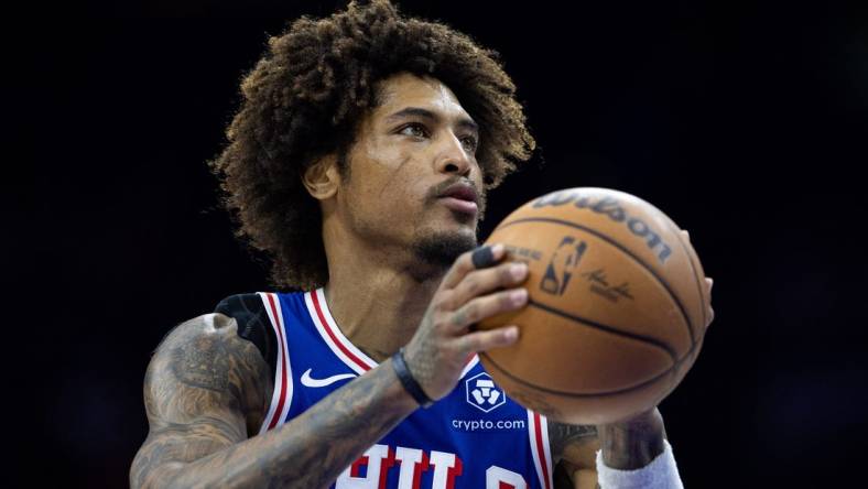 Mar 6, 2024; Philadelphia, Pennsylvania, USA; Philadelphia 76ers guard Kelly Oubre Jr. (9) shoots a foul shot against the Memphis Grizzlies during the second quarter at Wells Fargo Center. Mandatory Credit: Bill Streicher-USA TODAY Sports