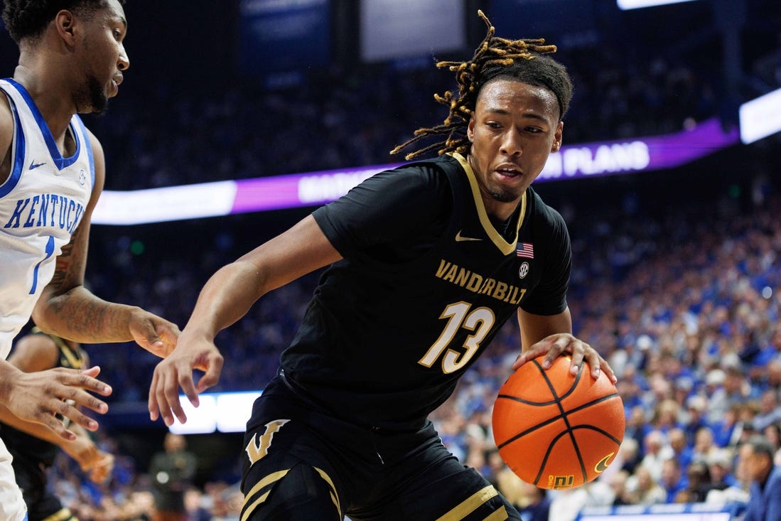 Mar 6, 2024; Lexington, Kentucky, USA; Vanderbilt Commodores guard Malik Presley (13) drives to the basket during the first half against the Kentucky Wildcats at Rupp Arena at Central Bank Center. Mandatory Credit: Jordan Prather-USA TODAY Sports