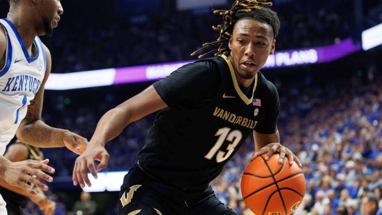 Mar 6, 2024; Lexington, Kentucky, USA; Vanderbilt Commodores guard Malik Presley (13) drives to the basket during the first half against the Kentucky Wildcats at Rupp Arena at Central Bank Center. Mandatory Credit: Jordan Prather-USA TODAY Sports