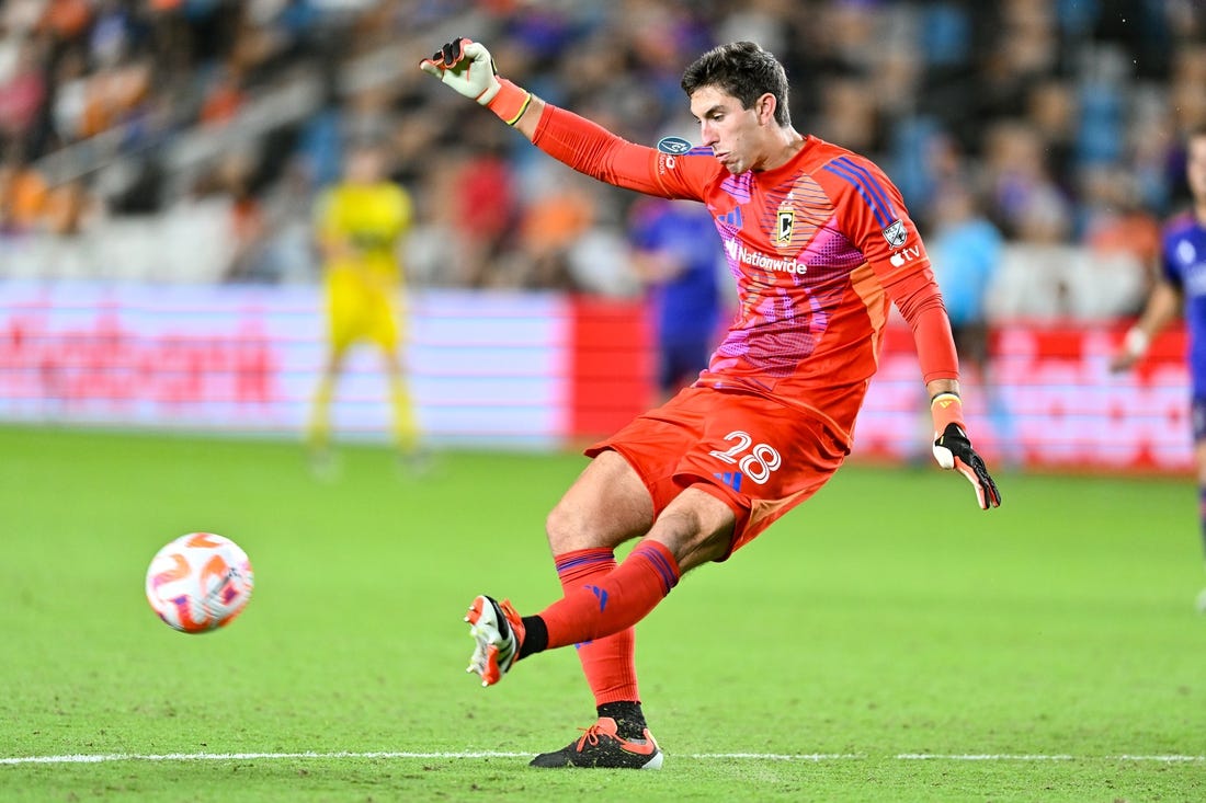 Columbus Crew goalkeeper Patrick Schulte (28) clears the balll during the second half against Houston Dynamo FC at Shell Energy Stadium. Mandatory Credit: Maria Lysaker-USA TODAY Sports