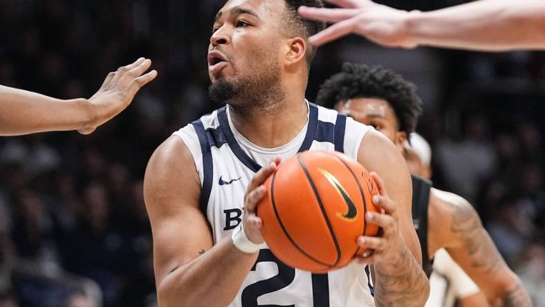 Butler Bulldogs guard Pierre Brooks II (21) searches to pass the ball Wednesday, March 6, 2024, during the game at Hinkle Fieldhouse in Indianapolis. The Butler Bulldogs defeated the Xavier Musketeers, 72-66.