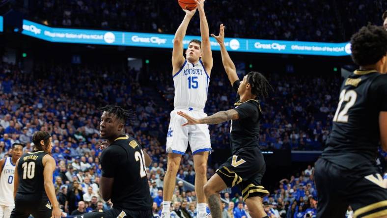 Mar 6, 2024; Lexington, Kentucky, USA; Kentucky Wildcats guard Reed Sheppard (15) shoots the ball during the second half against the Vanderbilt Commodores at Rupp Arena at Central Bank Center. Mandatory Credit: Jordan Prather-USA TODAY Sports