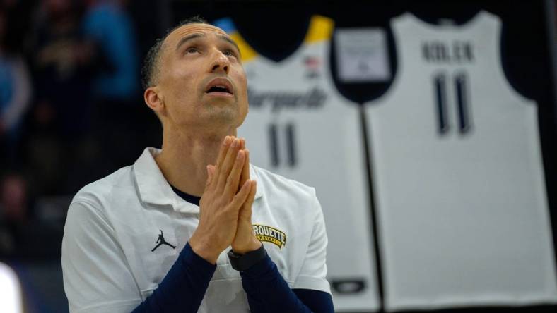 Marquette head coach Shaka Smart watches video highlights of guard Tyler Kolek and forward Oso Ighodaro being on senior day before their game against UConn Wednesday, March 6, 2024 at Fiserv Forum in Milwaukee, Wisconsin.