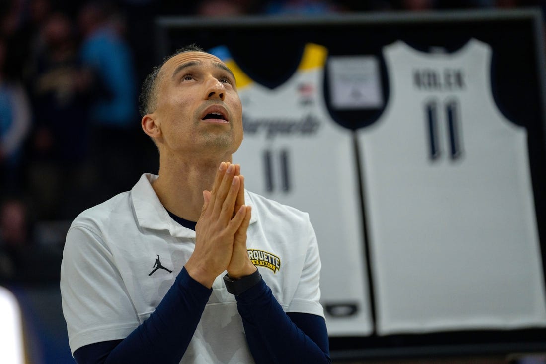 Marquette head coach Shaka Smart watches video highlights of guard Tyler Kolek and forward Oso Ighodaro being on senior day before their game against UConn Wednesday, March 6, 2024 at Fiserv Forum in Milwaukee, Wisconsin.