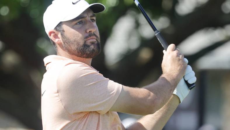 Mar 7, 2024; Orlando, Florida, USA;  Scottie Scheffler hits his drive on the first tee during the first round of the Arnold Palmer Invitational golf tournament. Mandatory Credit: Reinhold Matay-USA TODAY Sports