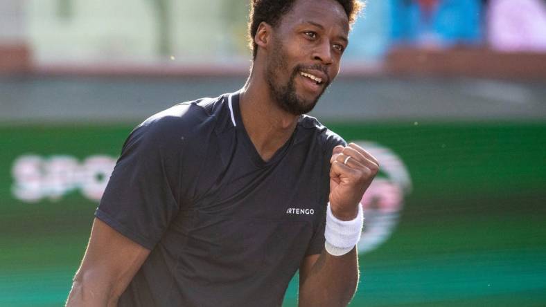 Gael Monfils celebrates winning his first-round match against Max Purcell at the BNP Paribas Open in Indian Wells, Calif., Thursday, March 7, 2024.