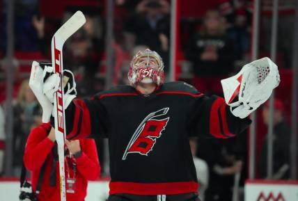 Mar 7, 2024; Raleigh, North Carolina, USA; Carolina Hurricanes goaltender Frederik Andersen (31) celebrates their victory after the game against the Montreal Canadiens at PNC Arena. Mandatory Credit: James Guillory-USA TODAY Sports