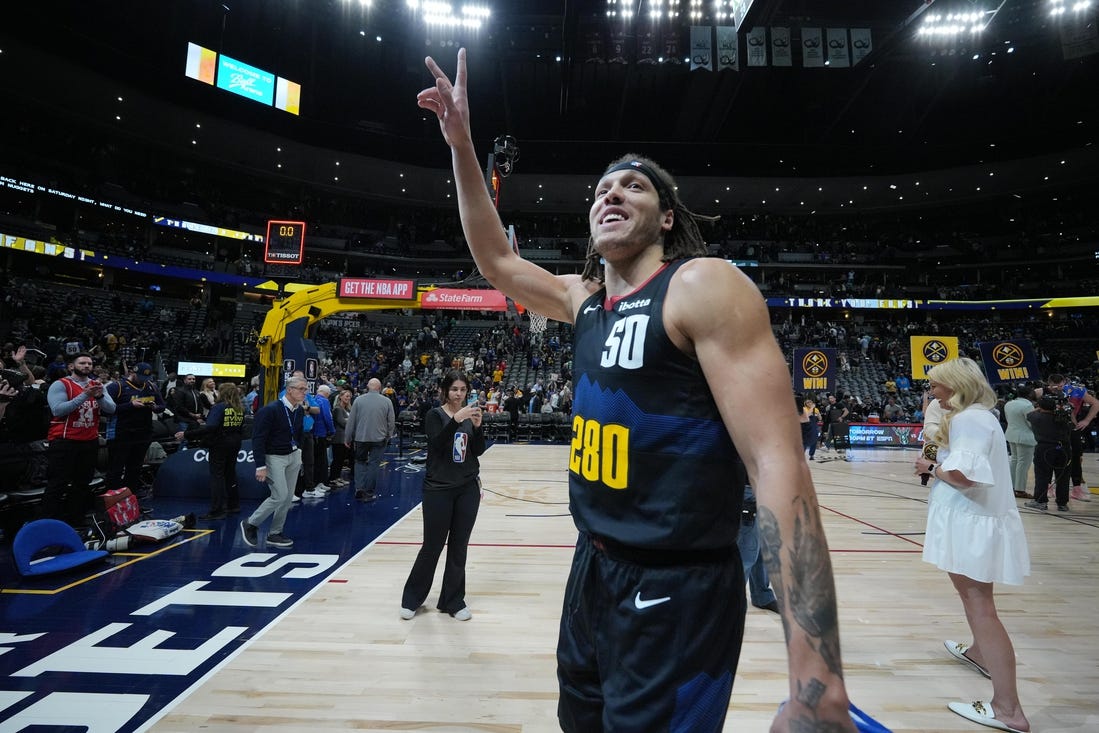 Mar 7, 2024; Denver, Colorado, USA; Denver Nuggets forward Aaron Gordon (50) waves to the crowd following the game against the Boston Celtics at Ball Arena. Mandatory Credit: Ron Chenoy-USA TODAY Sports