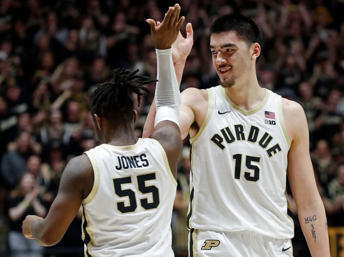 Purdue Boilermakers center Zach Edey (15) and Purdue Boilermakers guard Lance Jones (55) celebrate against the Rutgers Scarlet Knights, Thursday, Feb. 22, 2024, at Mackey Arena in West Lafayette, Ind. Purdue Boilermakers won 96-68.