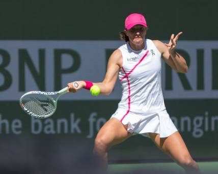 Iga Swiatek keeps her eyes on the ball against Danielle Collins during a second round BNP Paribas Open match at Indian Wells Tennis Garden in Indian Wells, California, on March 8, 2024.