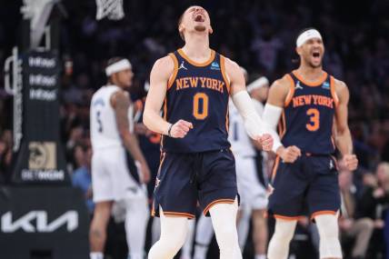 Mar 8, 2024; New York, New York, USA;  New York Knicks guard Donte DiVincenzo (0) celebrates in the first quarter against the Orlando Magic at Madison Square Garden. Mandatory Credit: Wendell Cruz-USA TODAY Sports