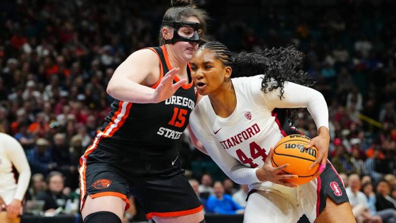 Mar 8, 2024; Las Vegas, NV, USA; Stanford Cardinal forward Kiki Iriafen (44) drives the lane against Oregon State Beavers forward Raegan Beers (15) during the fourth quarter at MGM Grand Garden Arena. Mandatory Credit: Stephen R. Sylvanie-USA TODAY Sports