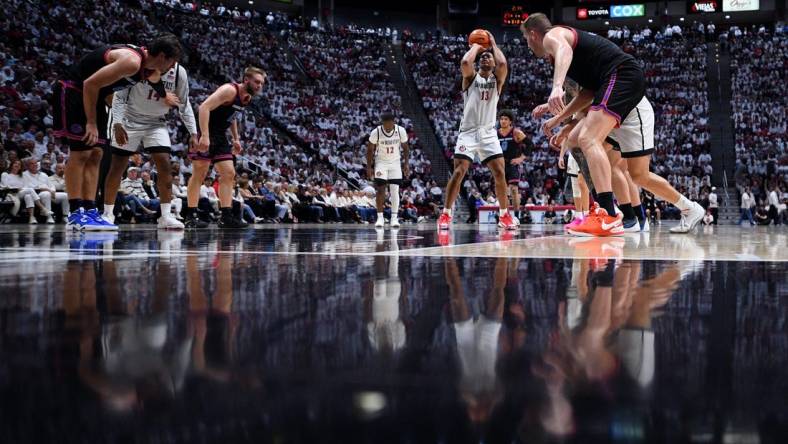 Mar 8, 2024; San Diego, California, USA; San Diego State Aztecs forward Jaedon LeDee (13) shoots a free throw against the Boise State Broncos during the first half at Viejas Arena. Mandatory Credit: Orlando Ramirez-USA TODAY Sports